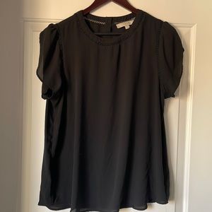 Black blouse from Loft size L. Flowey with cute design at the neck and shoulder